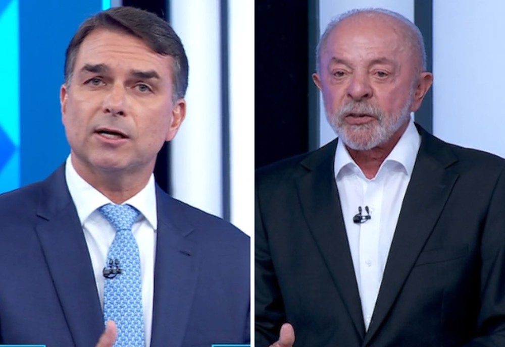 Flávio Bolsonaro e Lula durante o debate da Globo